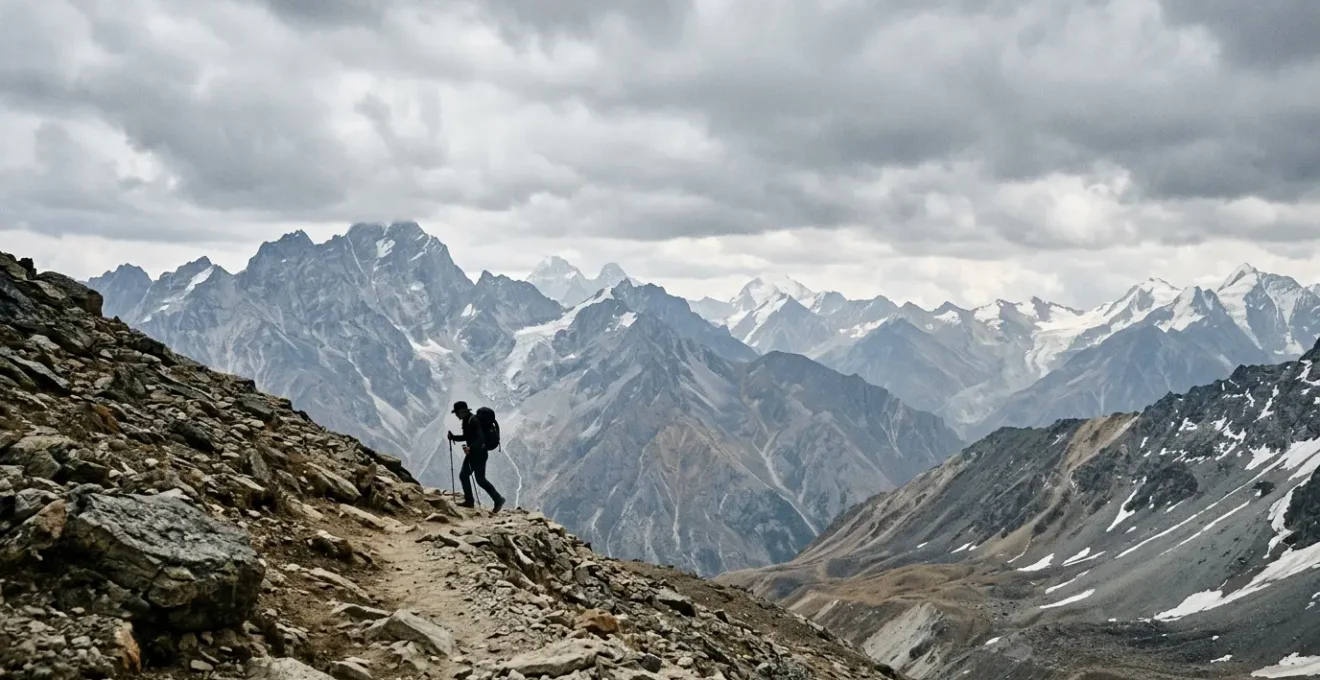 Mountaineer ascending steep alpine terrain at controlled pace with trekking poles under dramatic sky